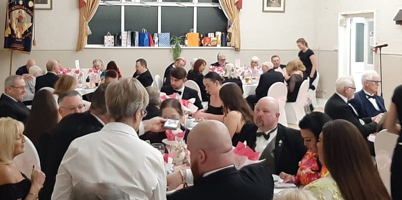 Guests seated at round tables during a function in the Main Hall