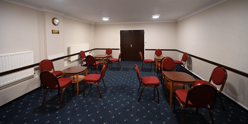 The Shirley Room laid out with tables and chairs